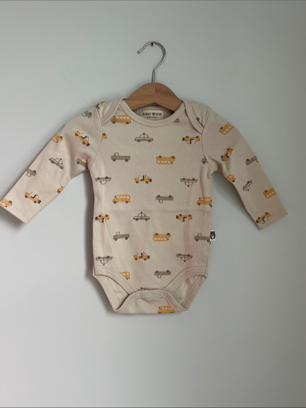 Rabbit + Bear | 100% Organic Cotton Cream Long-Sleeve Onesie Vehicle Print 6-9M
